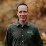 picture of Dr. Vinnie Cappetta standing in front of trees