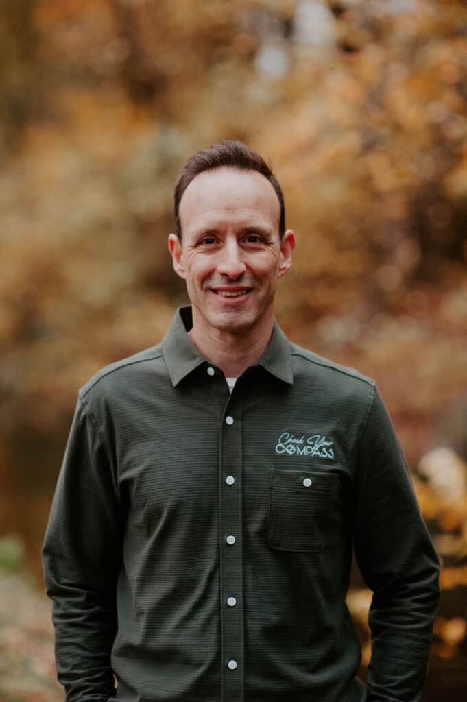 picture of Dr. Vinnie Cappetta standing in front of trees
