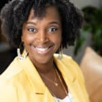 Professional picture of Karen Lanxon, Texas Christian counselor in a yellow blazer and white top underneath