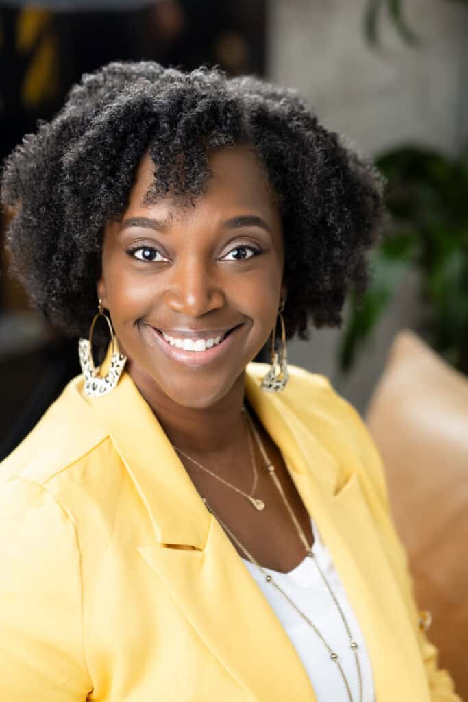 Professional picture of Karen Lanxon, Texas Christian counselor in a yellow blazer and white top underneath
