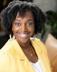 Professional picture of Karen Lanxon, Texas Christian counselor in a yellow blazer and white top underneath